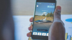 Logo van het Innoptus Solar Team, ontworpen door KAPMES, zichtbaar op de homepagina van de KBC app op smartphone.